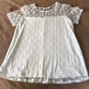 White on white polka dot top